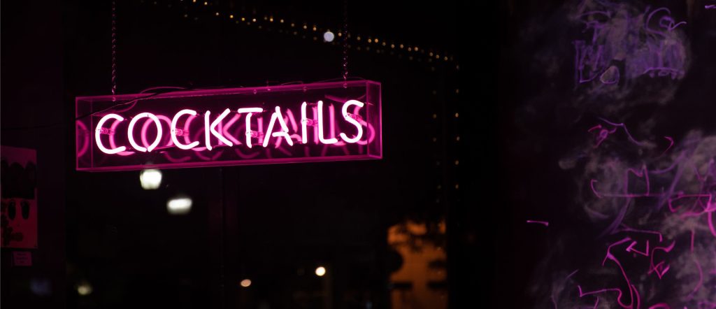 a neon sign in a window